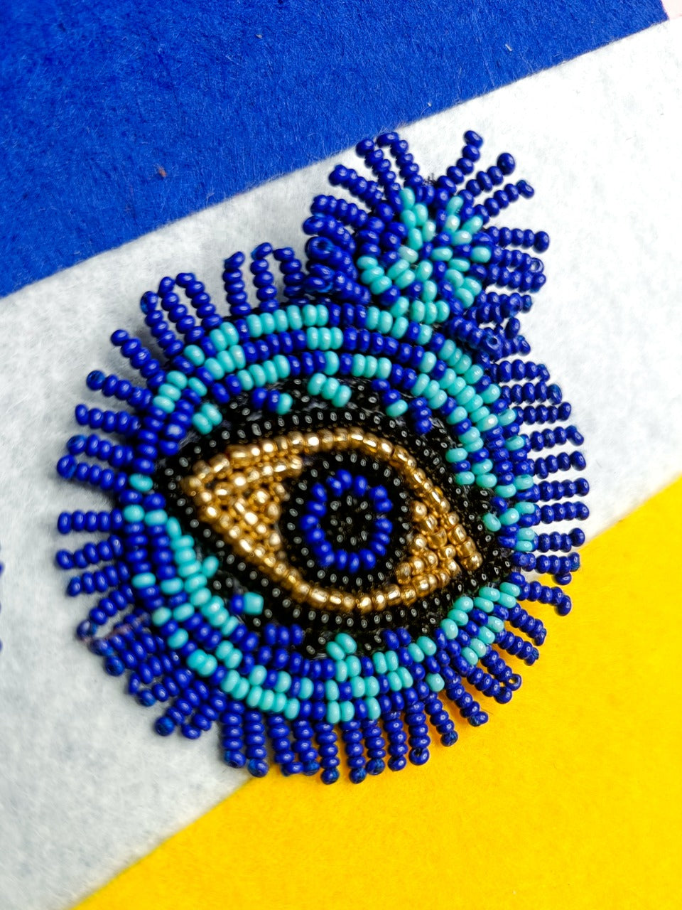 Round evil eye handmade blue earrings