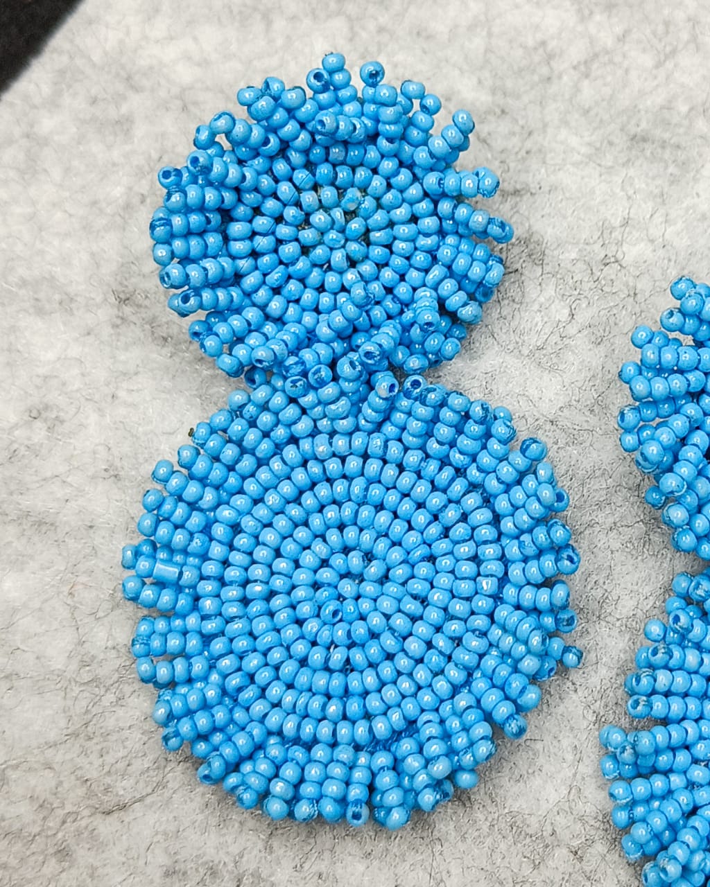 Hanging beaded handmade blue earrings