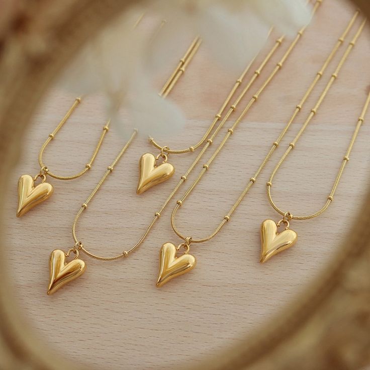 Golden Heart Charm Necklace with Beaded Detailing