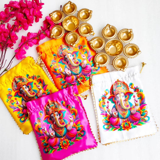 “Ganesh Print Potli with Urli Diya – Festive & Wedding Favor Set” ✨