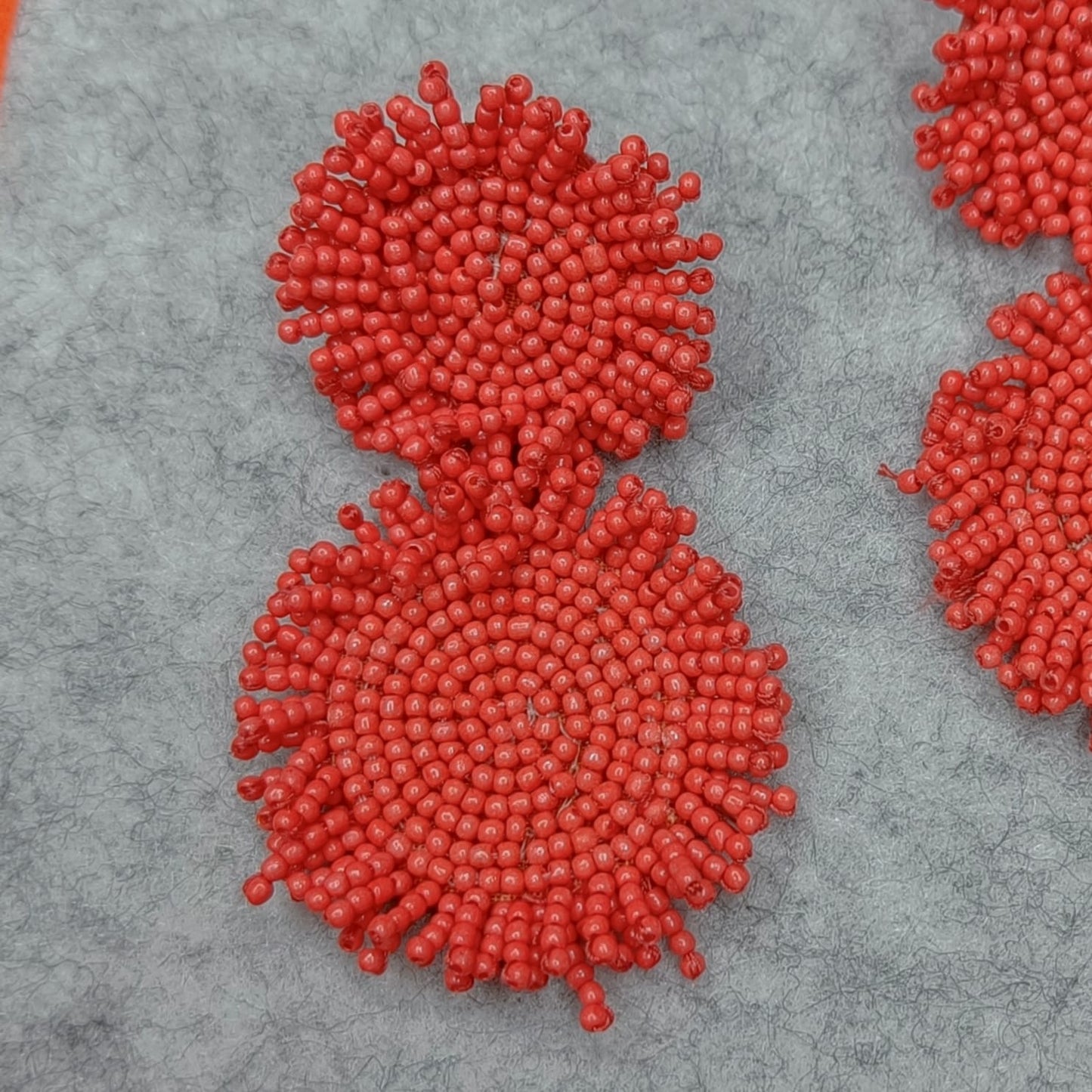 Hanging beaded handmade orange earrings