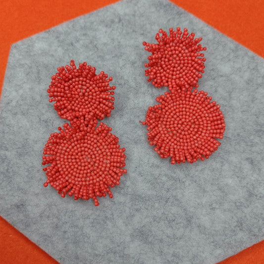 Hanging beaded handmade orange earrings